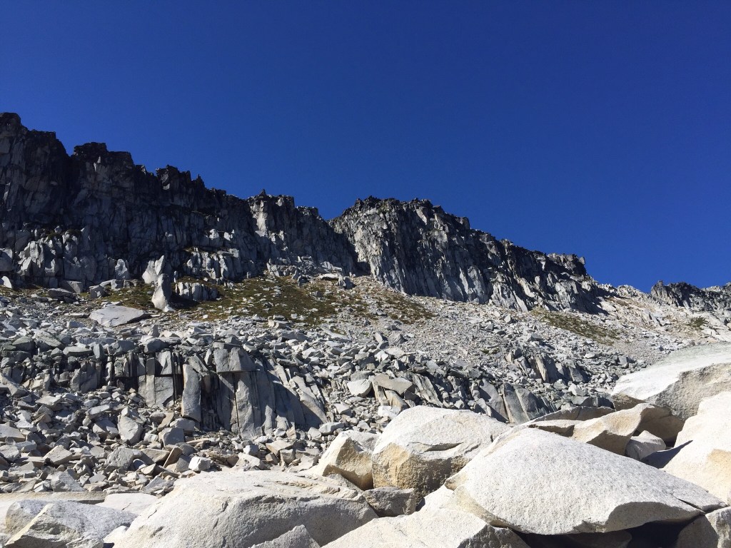 Opposite the lake, from our campsite. As geotechnical engineers, we decided the risk of getting squashed by a rockfall was "acceptable".  