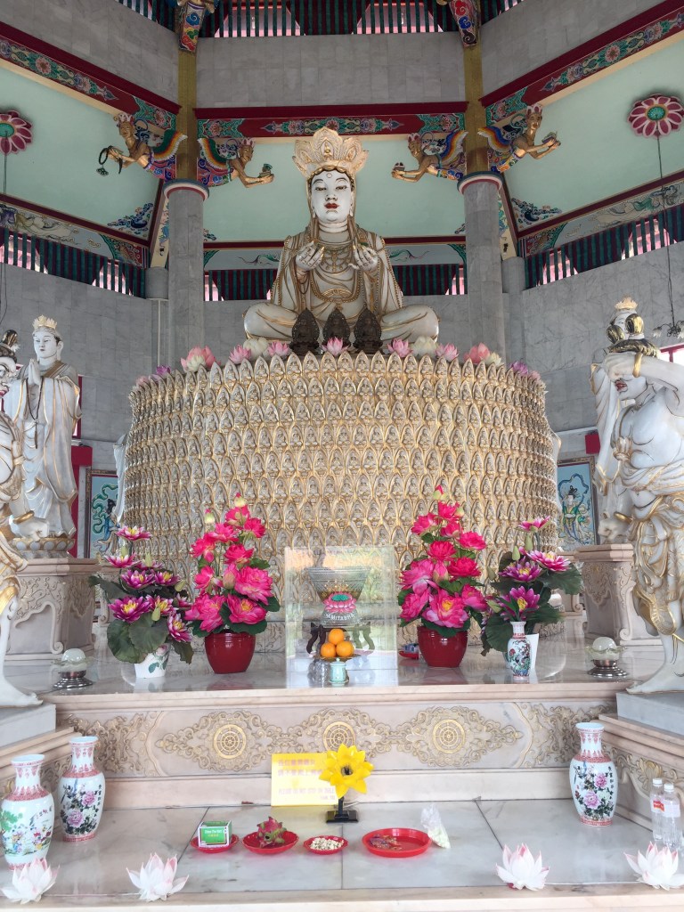 The two photos above are inside the Hall of Precepts. I started to enter and was quickly reminded (with a smile) to remove my sandals, please.