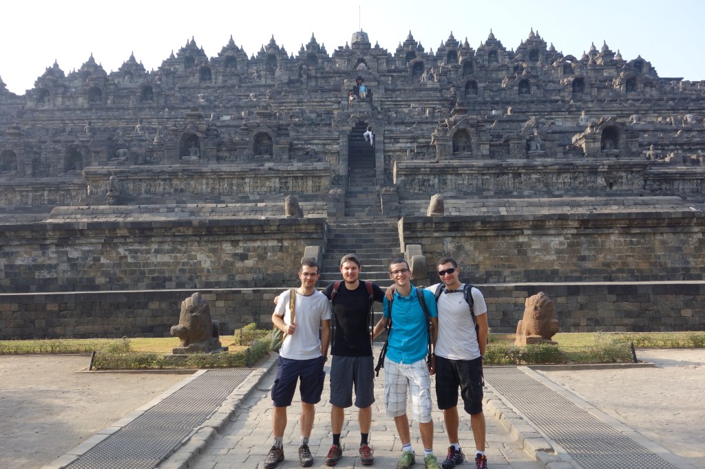 My new friends and I at the base of Borobudur. Built in the 9th century, it is still the largest Buddhist temple in the world and is still used as an annual pilgramage site. It is literally build around a hill, and the path to the top ascends through three levels symbolic of Buddhist cosmology: Kamadhatu (the world of desire), Rupadhatu (the world of forms) and Arupadhatu (the world of formlessness). 
