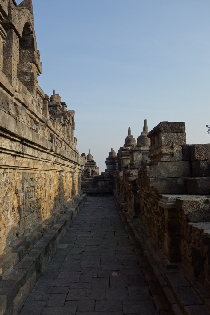 Some of the 1,460 intricately carved narrative relief panels that extend around the circumference of each terrace. They depict scenes ranging from daily life in ancient Java to important symbols and subjects of Buddhist beliefs. Some areas were discovered with colorful paint residue indicating that the now gray stone was once decorated with many different hues. 